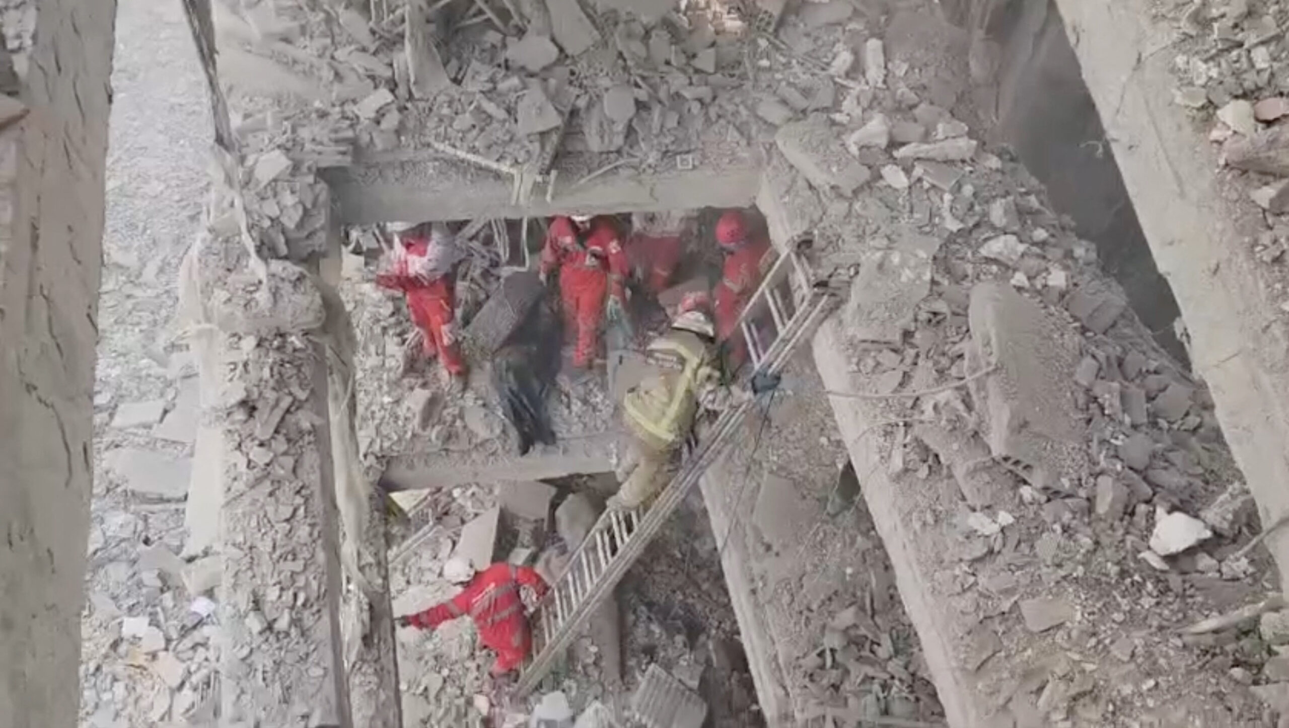 Rescuers work in the rubble of residential buildings after air strikes, in the Resalat neighborhood Rescuers work in the rubble of residential buildings after air strikes, in the Resalat neighborhood, in Tehran, Iran, in this screengrab obtained from a handout video released March 9, 2026. Iranian Red Crescent Society/Handout via REUTERS THIS IMAGE HAS BEEN SUPPLIED BY A THIRD PARTY. MANDATORY CREDIT. NO RESALES. NO ARCHIVES. Verification Lines: Road layout, building exterior and trees matched satellite imagery Coordinates of the damaged buildings: 35.73951256658418, 51.48752698828381 Date not verified but no older version of the video was found posted online before March 9. Local media reported that residential buildings in Resalat neighborhood got hit during air strikes on March 9