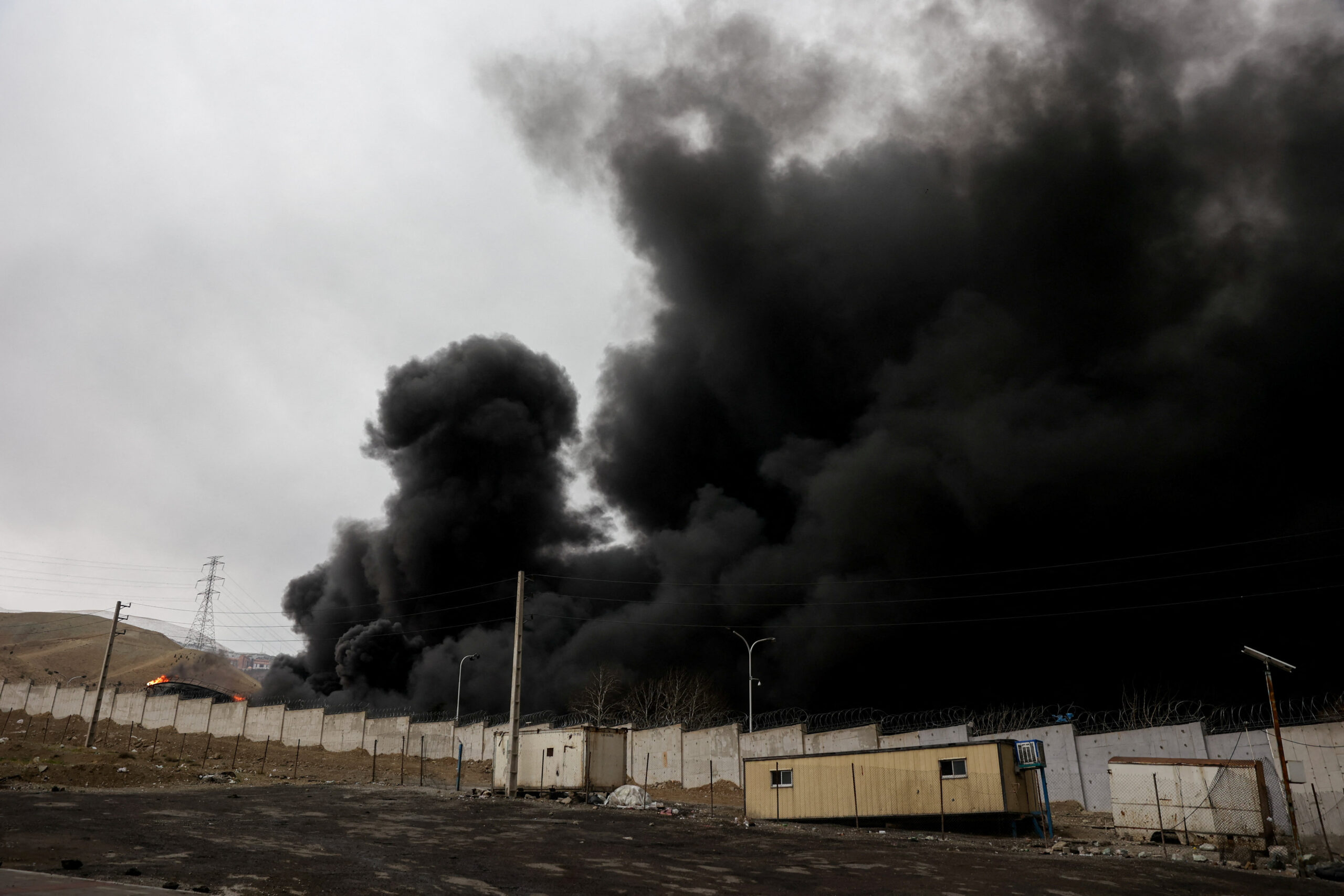 Smoke rises after a reported strike on Shahran fuel tanks, amid the U.S.-Israeli conflict with Iran, in Tehran Smoke rises after a reported strike on Shahran fuel tanks, amid the U.S.-Israeli conflict with Iran, in Tehran, Iran, March 8, 2026. Majid Asgaripour/WANA (West Asia News Agency) via REUTERS ATTENTION EDITORS - THIS PICTURE WAS PROVIDED BY A THIRD PARTY