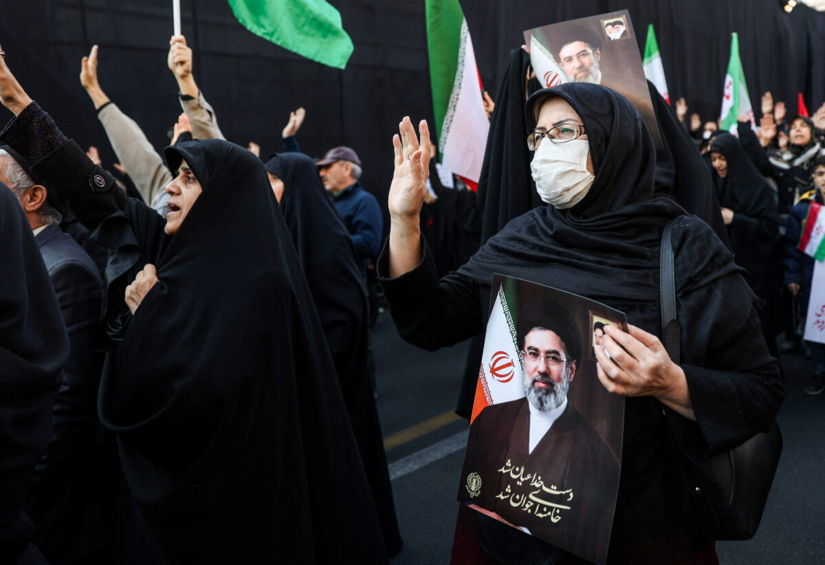 People gather in support of Iran’s new supreme leader Mojtaba Khamenei, in Tehran West Asia News Agency) via REUTERS