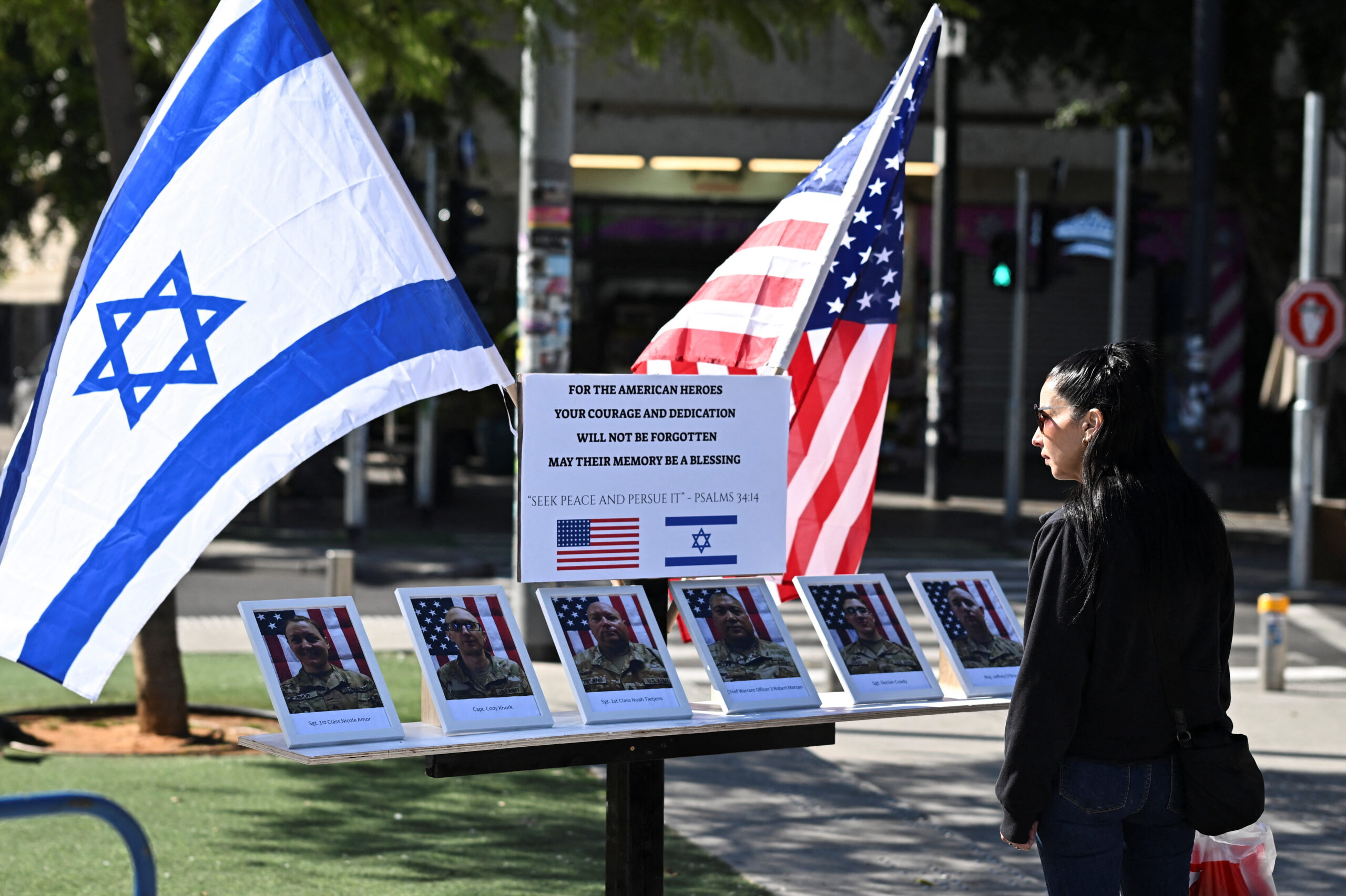 Makeshift memorial in tribute to the fallen U.S soldiers, in Tel Aviv A woman looks at a makeshift memorial in tribute to the fallen U.S soldiers, amid the U.S.-Israeli conflict with Iran, in central Tel Aviv, Israel, March 10, 2026. REUTERS/Dylan Martinez