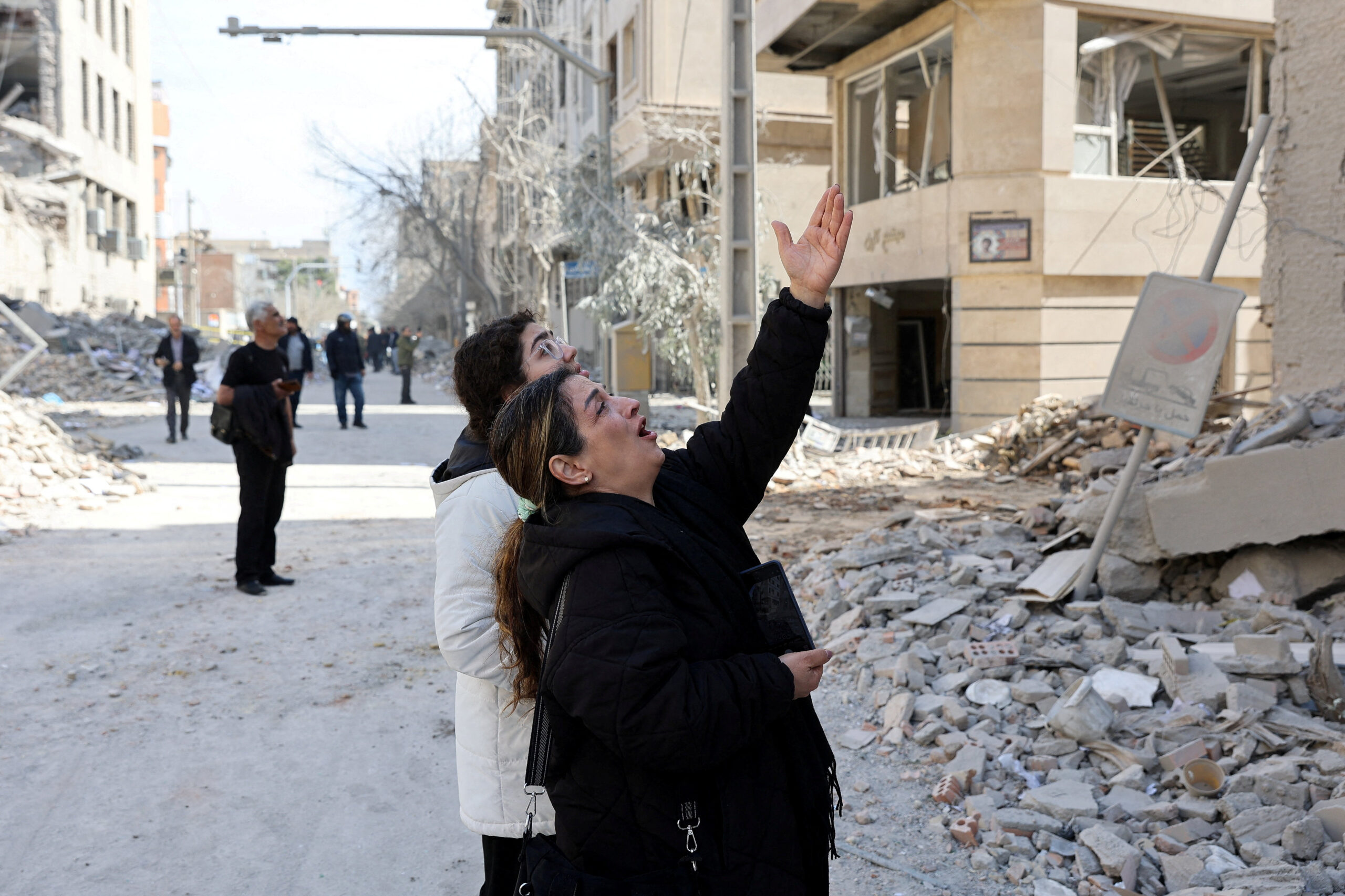 Aftermath of a strike on a police station, amid the U.S.-Israeli conflict with Iran, in Tehran A woman gestures as she reacts following a strike on a police station, amid the U.S.-Israeli conflict with Iran, in Tehran, Iran, March 4, 2026. Majid Asgaripour/WANA (West Asia News Agency) via REUTERS ATTENTION EDITORS - THIS PICTURE WAS PROVIDED BY A THIRD PARTY TPX IMAGES OF THE DAY