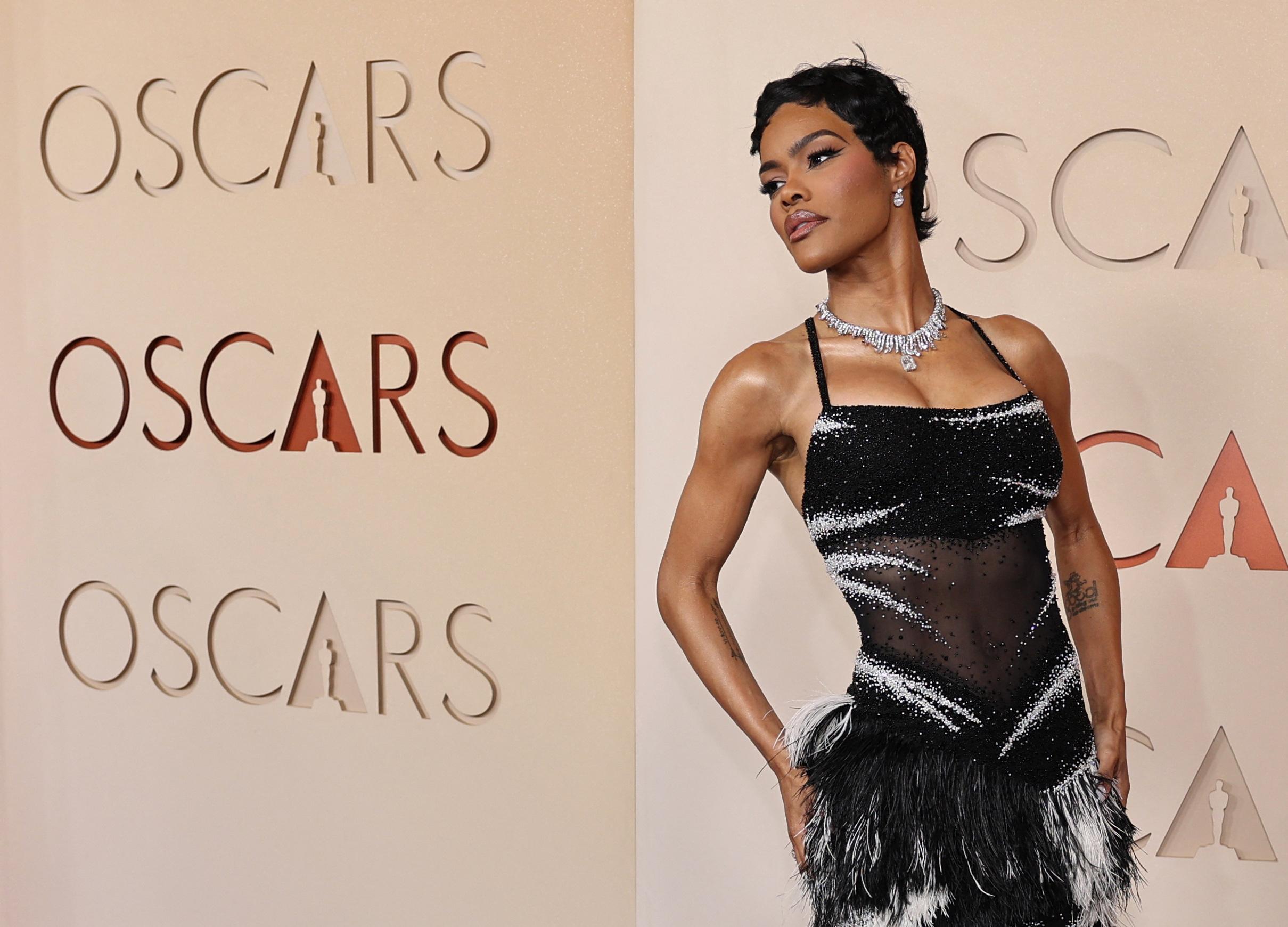 Teyana Taylor poses on the red carpet during the Oscars arrivals at the 98th Academy Awards in Hollywood, Los Angeles, California, U.S., March 15, 2026. REUTERS