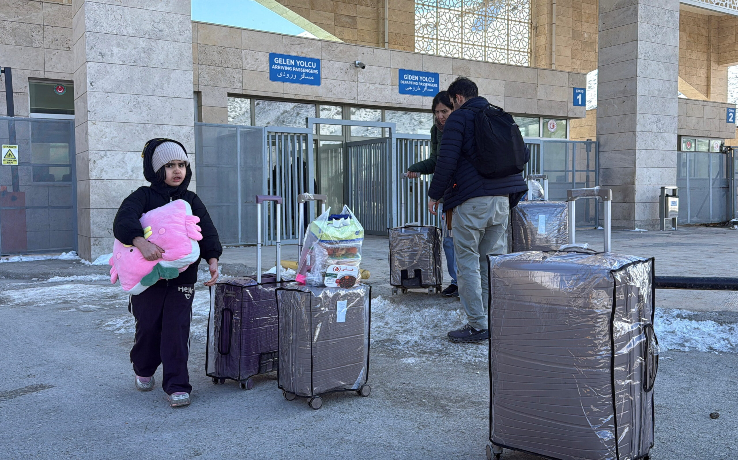 Kapikoy Border Gate, between Turkey and Iran, in Van province People stand at the Kapikoy Border Gate after crossing into Turkey from Iran, in Van province, Turkey, March 1, 2026. REUTERS/Ismet Mikailogullari