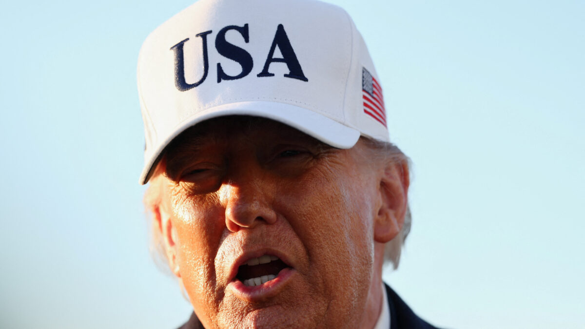 U.S. President Donald Trump speaks to members of the media before boarding Air Force One for travel to Florida, at Joint Base Andrews, Maryland, U.S., March 13, 2026. REUTERS/Kevin Lamarque