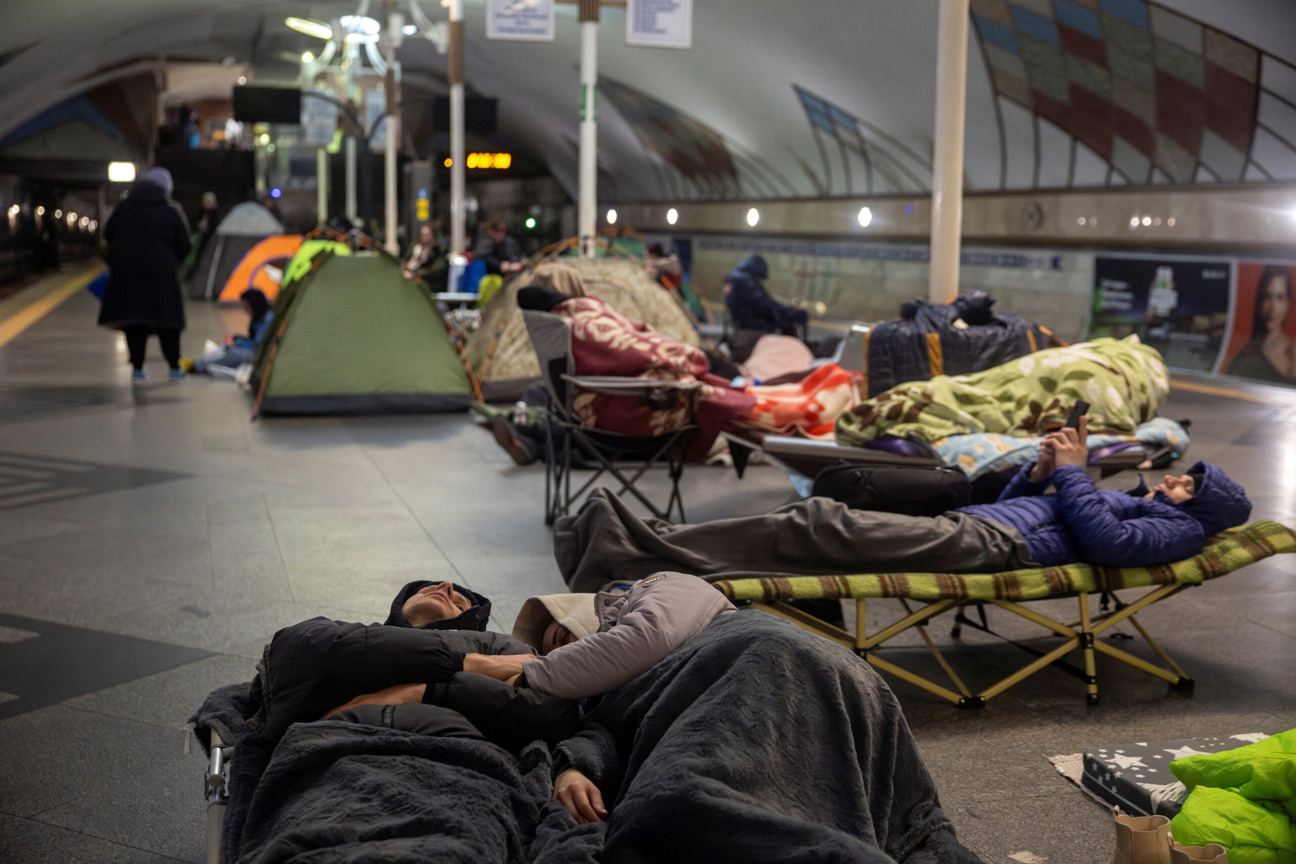 People shelter in a metro station during an air raid warning in Kyiv, amid Russia's attack on Ukraine, March 24, 2026. REUTERS/Thomas Peter