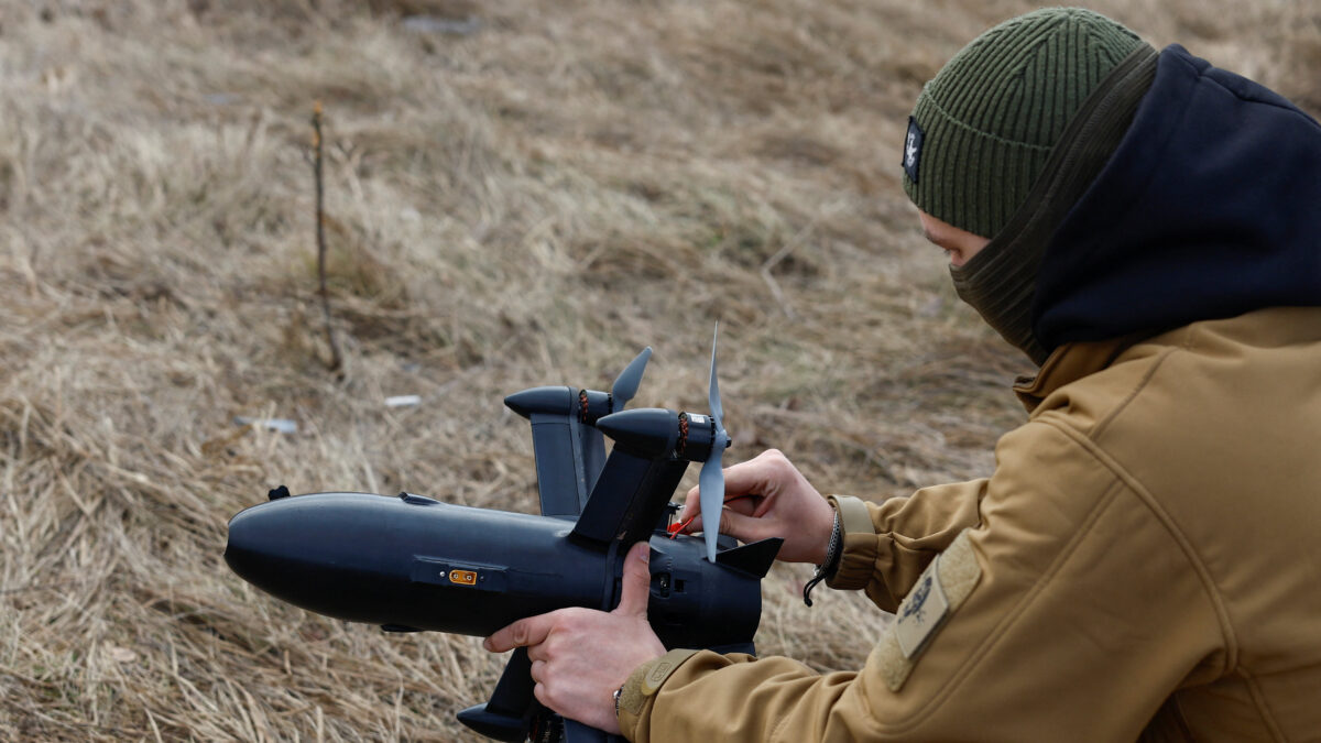 An employee checks P1-Sun FPV interceptor drone before flying it at a training ground during an examination for military drone operators of the SkyFall fly academy, amid Russia's attack on Ukraine, in an undisclosed location, Ukraine March 6, 2026. REUTERS/Valentyn Ogirenko