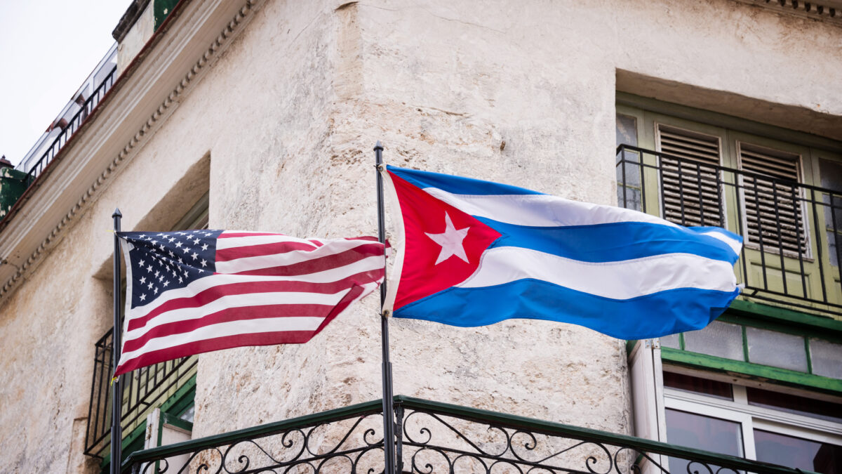 US and Cuban flags side by side in Havana, Cuba