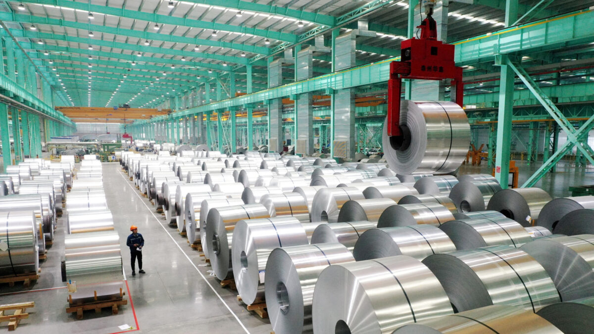 FILE PHOTO: FILE PHOTO: A drone view shows an employee working on the production line of aluminium products at a factory in Huaibei, Anhui province, China February 11, 2025. China Daily via REUTERS ATTENTION EDITORS - THIS PICTURE WAS PROVIDED BY A THIRD PARTY. CHINA OUT. NO COMMERCIAL OR EDITORIAL SALES IN CHINA./File Photo/File Photo