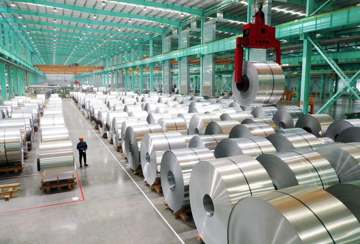 FILE PHOTO: FILE PHOTO: A drone view shows an employee working on the production line of aluminium products at a factory in Huaibei, Anhui province, China February 11, 2025. China Daily via REUTERS ATTENTION EDITORS - THIS PICTURE WAS PROVIDED BY A THIRD PARTY. CHINA OUT. NO COMMERCIAL OR EDITORIAL SALES IN CHINA./File Photo/File Photo