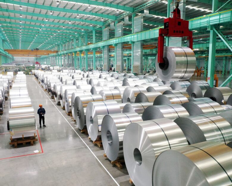 FILE PHOTO: FILE PHOTO: A drone view shows an employee working on the production line of aluminium products at a factory in Huaibei, Anhui province, China February 11, 2025. China Daily via REUTERS ATTENTION EDITORS - THIS PICTURE WAS PROVIDED BY A THIRD PARTY. CHINA OUT. NO COMMERCIAL OR EDITORIAL SALES IN CHINA./File Photo/File Photo