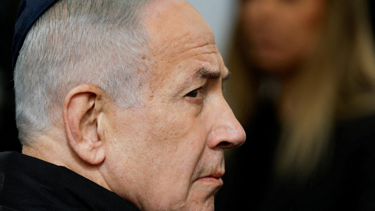 FILE PHOTO: Israeli Prime Minister Benjamin Netanyahu attends a memorial service held for Ran Gvili, an off-duty police officer who was killed fighting militants that had infiltrated Israel during the deadly October 7, 2023, attack by Hamas, and the last hostage recovered from Gaza, in Meitar, Israel, January 28, 2026. REUTERS/Amir Cohen TPX IMAGES OF THE DAY/File Photo