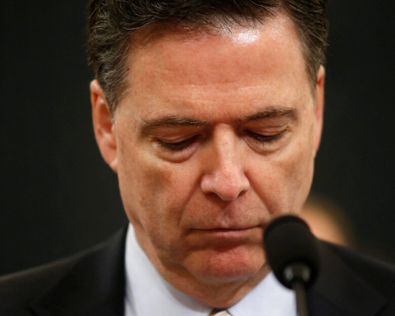 FILE PHOTO: FBI Director James Comey testifies before the House Intelligence Committee hearing into alleged Russian meddling in the 2016 U.S. election on Capitol Hill in Washington, U.S., March 20, 2017. REUTERS/Joshua Roberts/File Photo