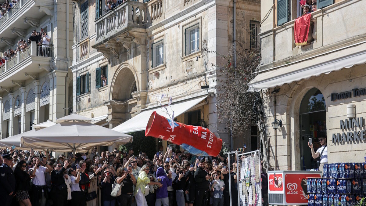 A clay pot filled with water falls after being thrown from a balcony during the Greek Orthodox Easter celebration of "Botides", on Holy Saturday, marking the so-called "First Resurrection", on the island of Corfu, Greece, April 19, 2025.