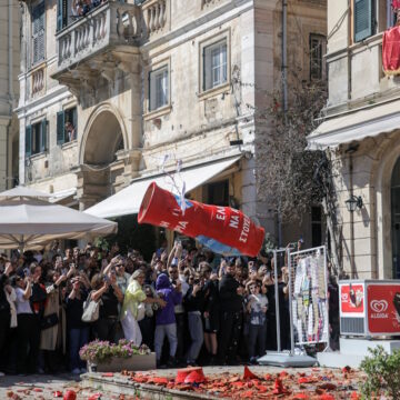 A clay pot filled with water falls after being thrown from a balcony during the Greek Orthodox Easter celebration of "Botides", on Holy Saturday, marking the so-called "First Resurrection", on the island of Corfu, Greece, April 19, 2025.