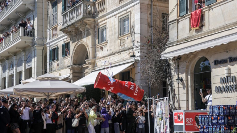 A clay pot filled with water falls after being thrown from a balcony during the Greek Orthodox Easter celebration of "Botides", on Holy Saturday, marking the so-called "First Resurrection", on the island of Corfu, Greece, April 19, 2025.