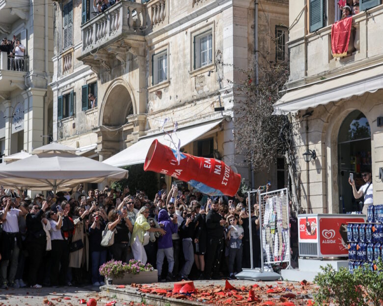 A clay pot filled with water falls after being thrown from a balcony during the Greek Orthodox Easter celebration of "Botides", on Holy Saturday, marking the so-called "First Resurrection", on the island of Corfu, Greece, April 19, 2025.