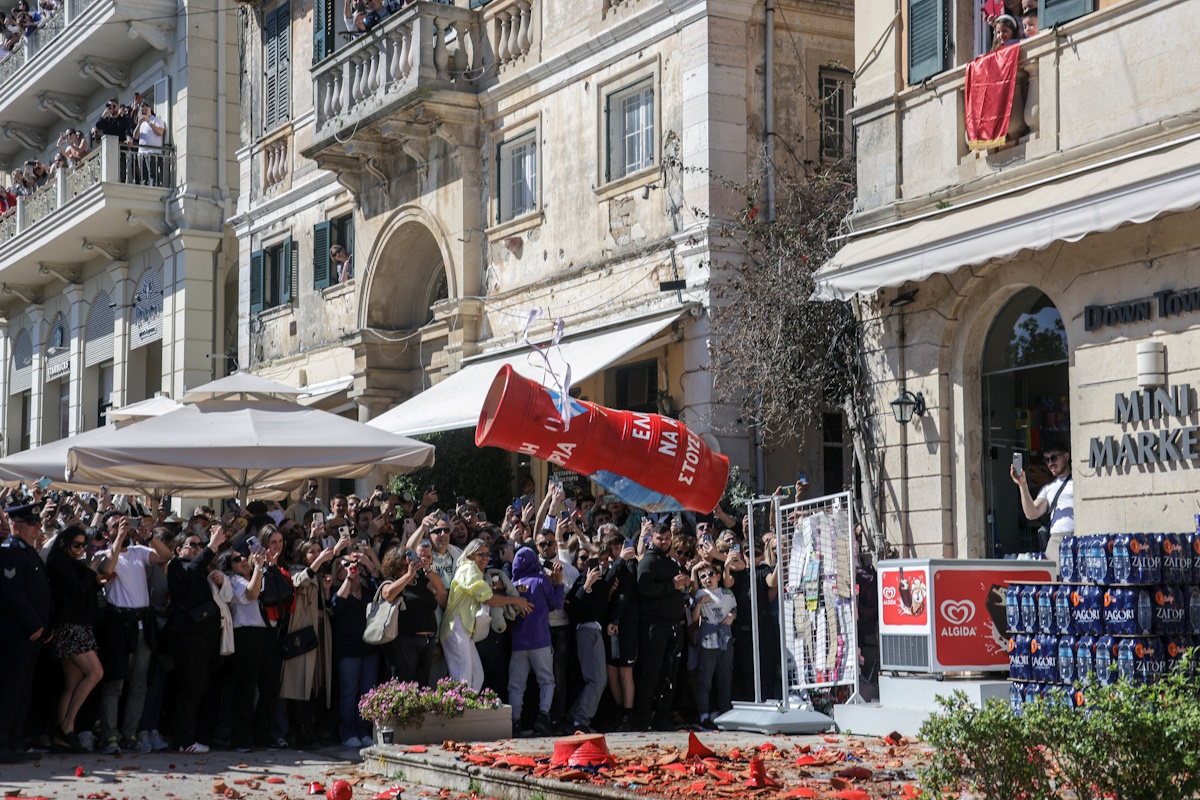 A clay pot filled with water falls after being thrown from a balcony during the Greek Orthodox Easter celebration of "Botides", on Holy Saturday, marking the so-called "First Resurrection", on the island of Corfu, Greece, April 19, 2025.