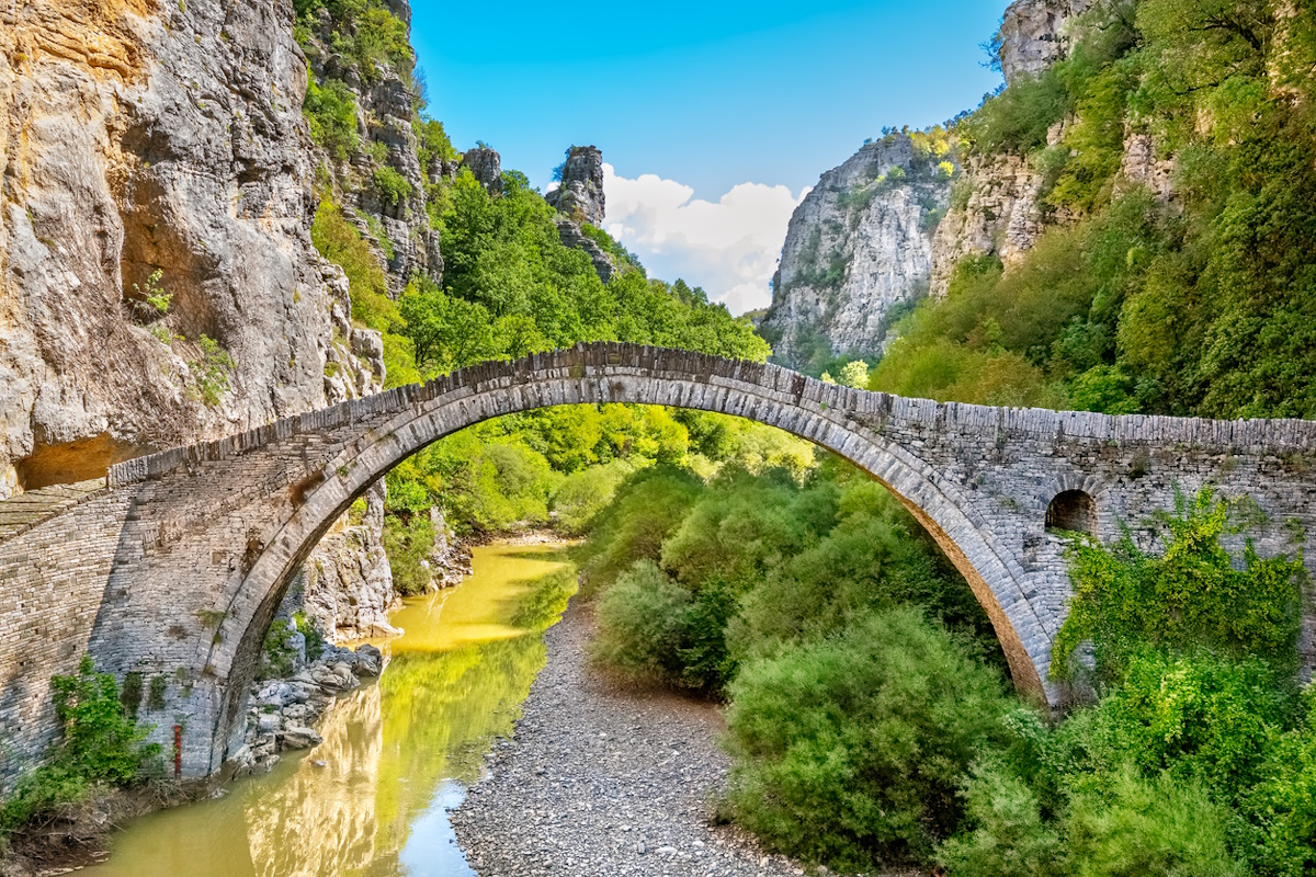 Stone bridge of Noutsos or Kokkoris over Voidomatis River. Zagorochoria, Epirus, Greece