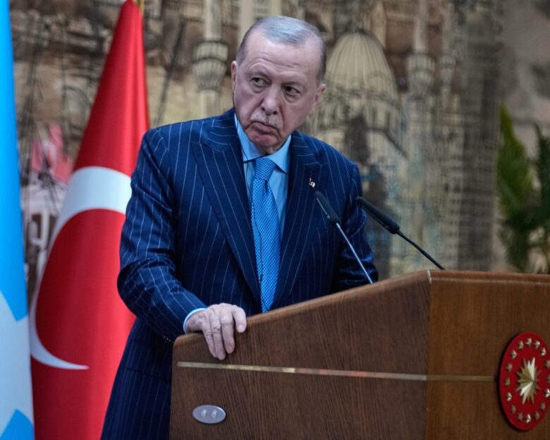 Turkey's President Recep Tayyip Erdogan listens as Somalia's President Hassan Sheikh Mohamud speaks during a joint news conference in Istanbul, Turkey, Tuesday, Dec. 30, 2025. (