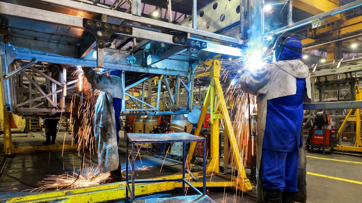 Workers operate on the bus body production line at the factory of Marcopolo, one of the world’s largest bus manufacturers with operations across multiple continents, in Caxias do Sul, Brazil, March 25, 2026. REUTERS/Diego Vara