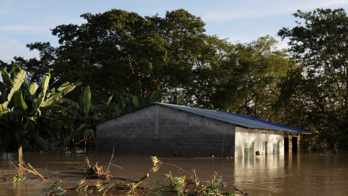 A house almost submerged in water is seen after floods caused by rains from a cold front in the northern hemisphere in Torno Rojo, Colombia, February 3, 2026. REUTERS/Luis Felipe Osorio