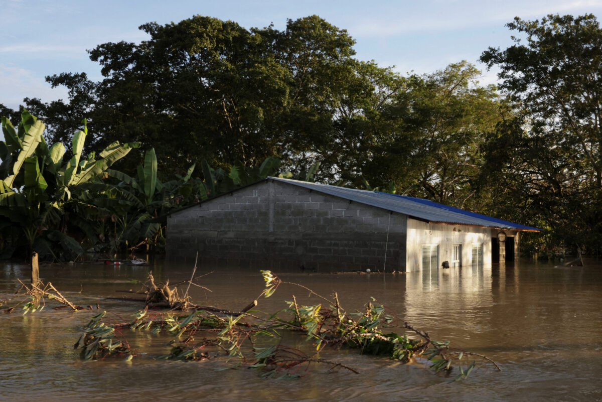 A house almost submerged in water is seen after floods caused by rains from a cold front in the northern hemisphere in Torno Rojo, Colombia, February 3, 2026. REUTERS/Luis Felipe Osorio