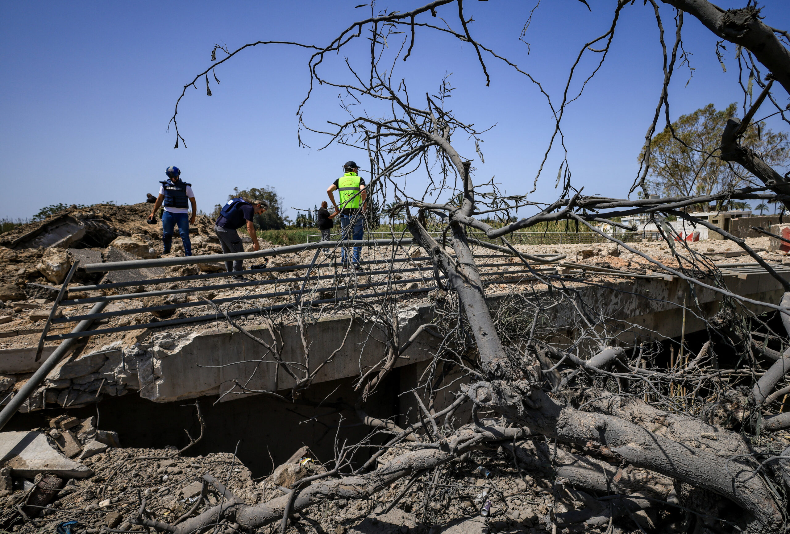 Aftermath of an Israeli strike that severed the last remaining bridge linking southern Lebanon to the rest of the country, in Qasmiyeh Members of the media work at the site after an Israeli strike severed the last remaining bridge linking southern Lebanon to the rest of the country, in Qasmiyeh, Lebanon April 16, 2026. REUTERS/Louisa Gouliamaki