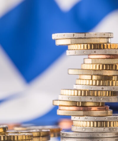 National flag of greece and euro coins - concept. Euro coins. Euro money. Euro currency.