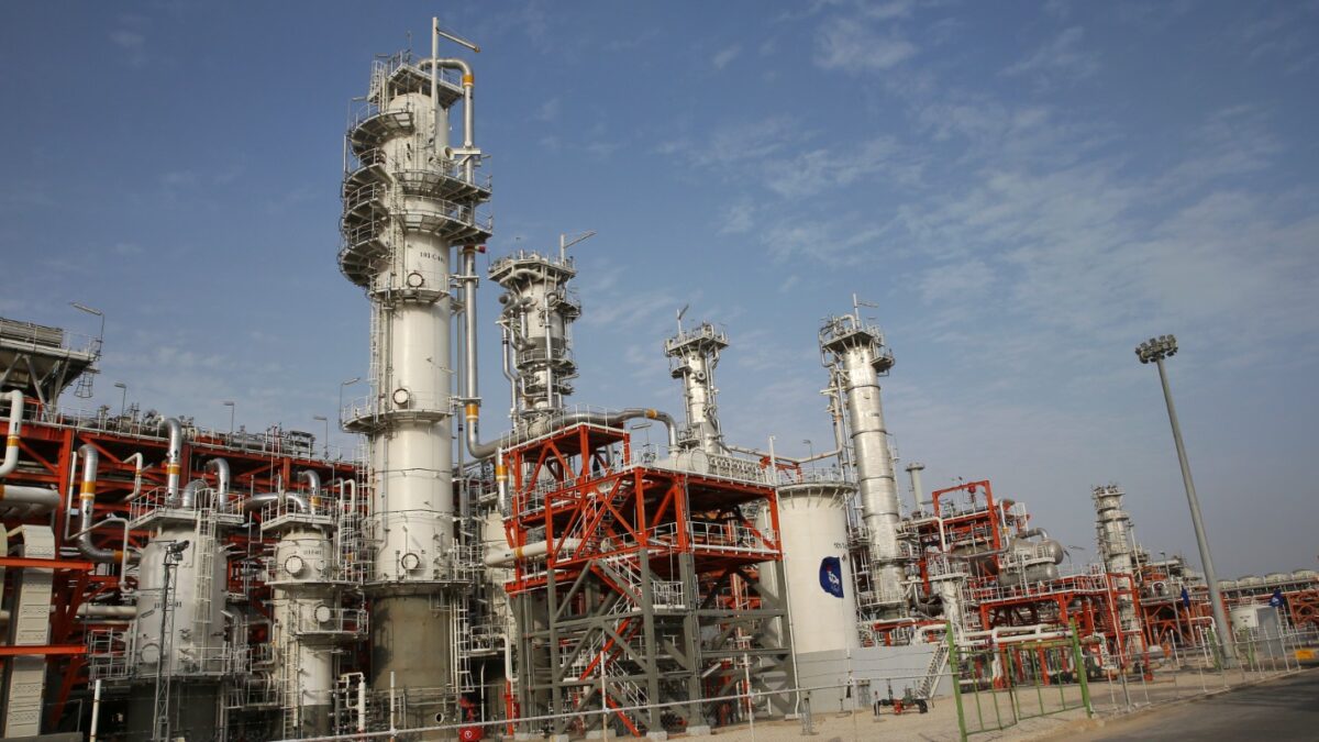 FILE--This March 16, 2019 file photo, shows a natural gas refinery at the South Pars gas field on the northern coast of the Persian Gulf, in Asaluyeh, Iran. China's state oil company has pulled out of a $5 billion deal to develop a portion of Iran's massive offshore natural gas field, the Islamic Republic's oil minister said Sunday, Oct. 6, 2019, an agreement from which France's Total SA earlier withdrew over U.S. sanctions. (AP Photo/Vahid Salemi, File)
