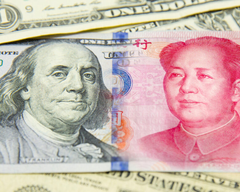 banknote,dollar and yuan.economy chess conpetition concept.the many banknote.Pile of various currencies .Closeup of assorted Chinese and american banknotes.currency Money of China And America dollor