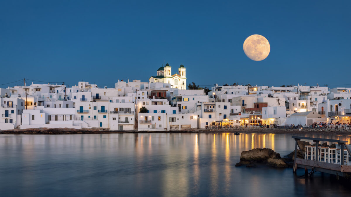 August summer full moon over the idyllic village of Naousa on on the island of Paros, Cyclades, Greece