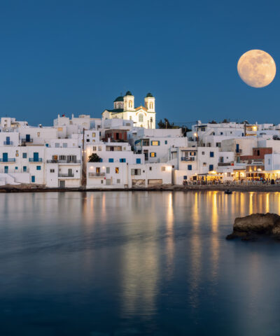 August summer full moon over the idyllic village of Naousa on on the island of Paros, Cyclades, Greece