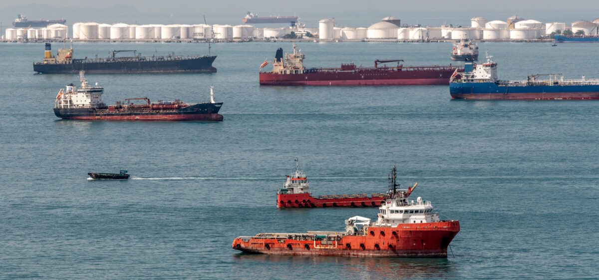 Oil tank farm and ships off the coast of Singapore