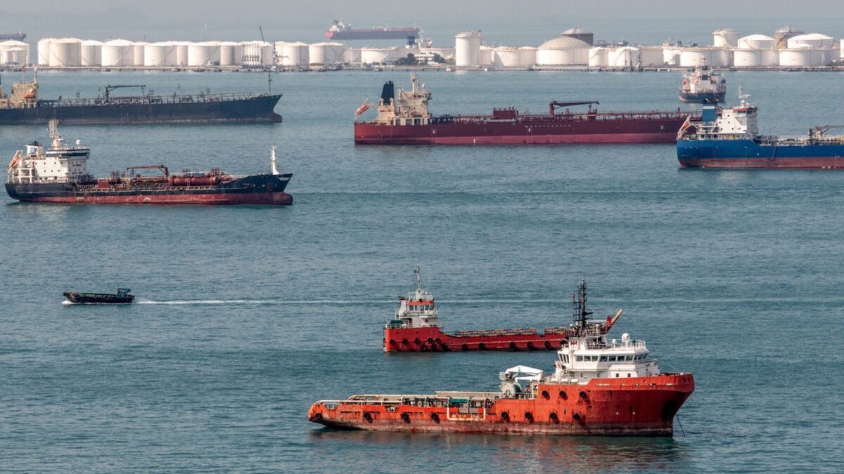 Oil tank farm and ships off the coast of Singapore