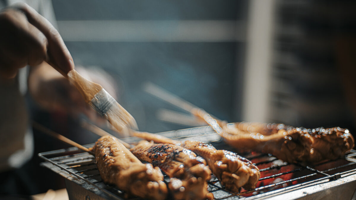 a night bbq party gathering with food preparation