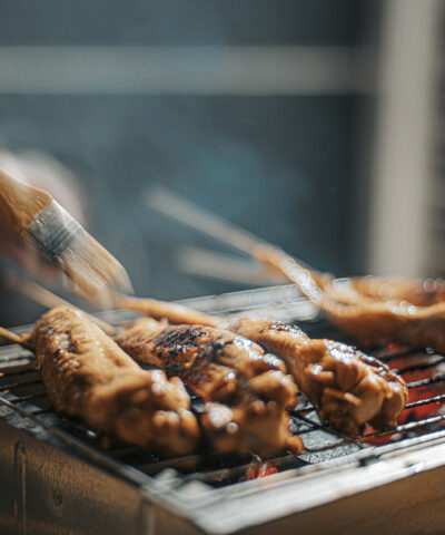 a night bbq party gathering with food preparation