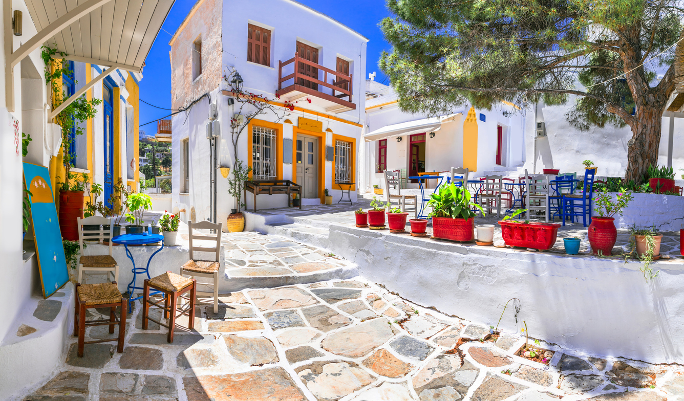 Beautiful Lefkes traditional greek village in Paros island. Charming coffe bars and taverns in colorful narrow streets. Cyclades , Greece