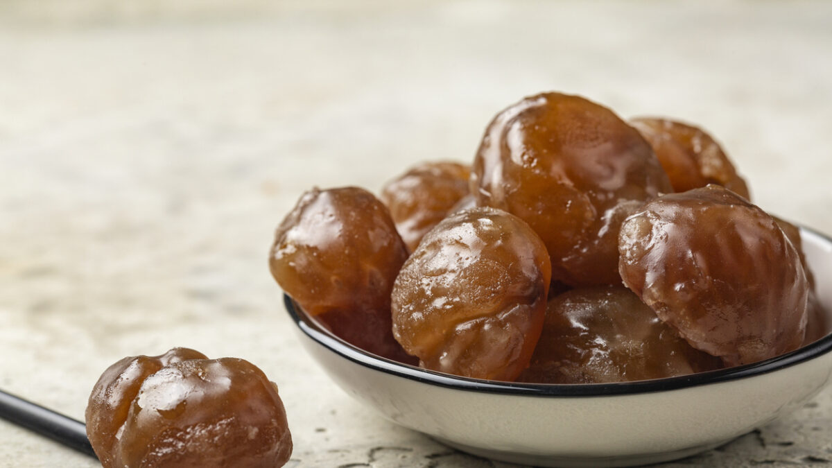 Chestnut candied sugar syrup and glazed or marron glacé, confection, originating in northern Italy and southern France. Close up.
