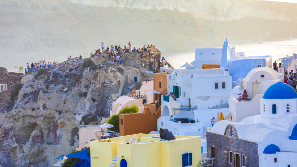 view of stucco buildings in Fira Village, Santorini in Thera, Greece