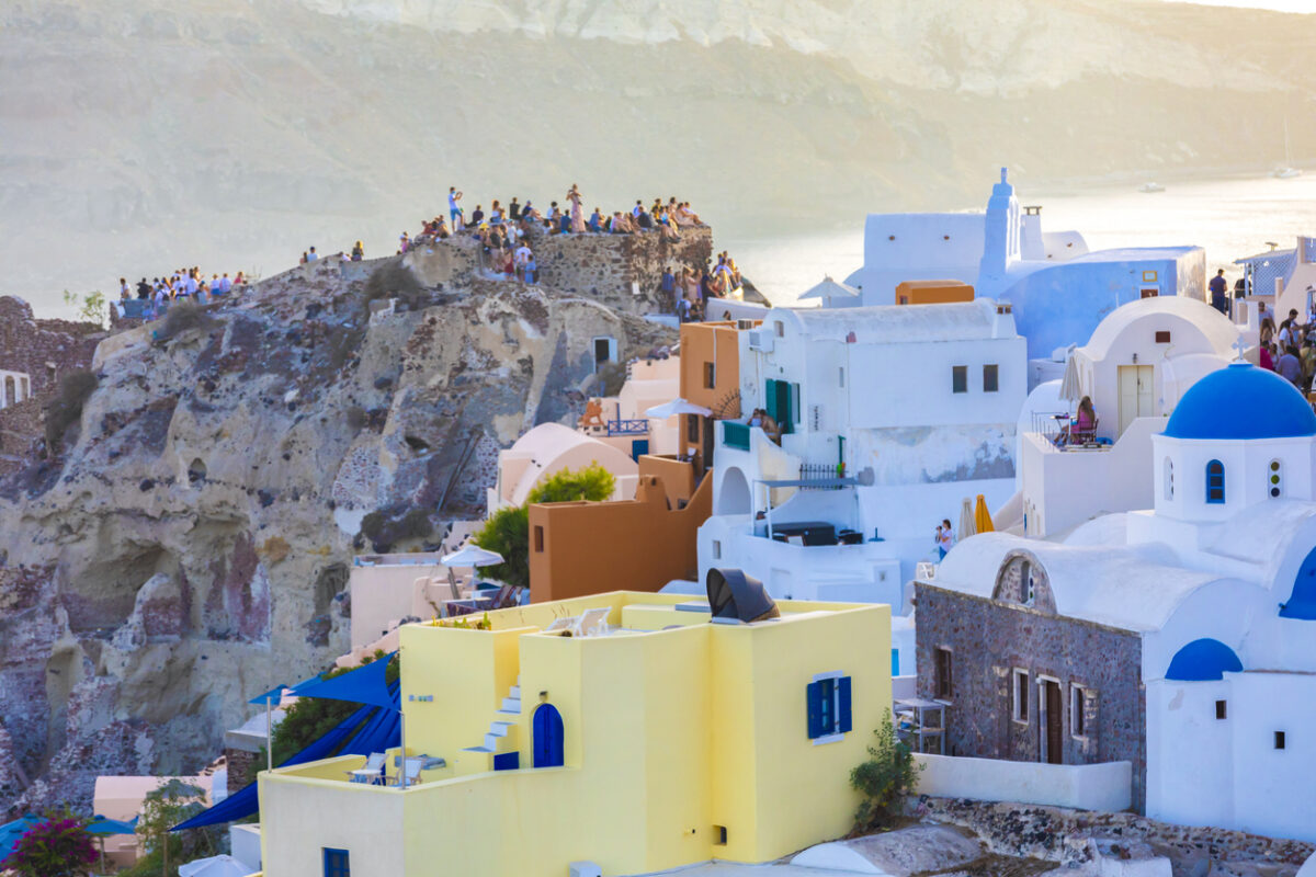 view of stucco buildings in Fira Village, Santorini in Thera, Greece