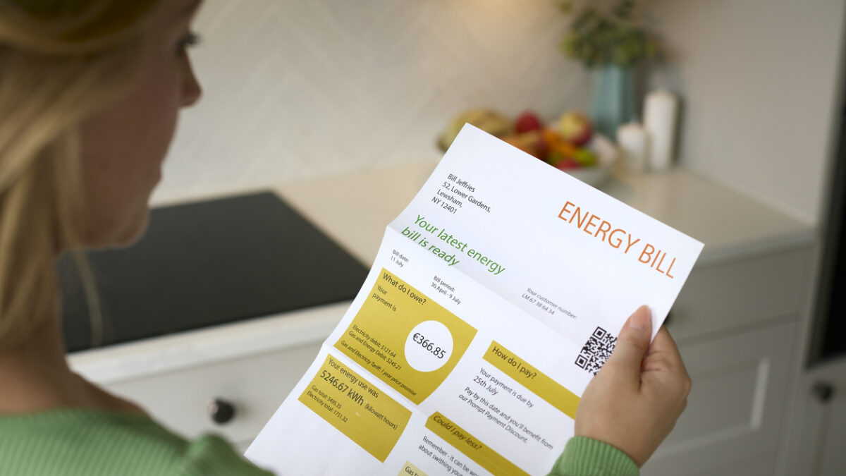 Close Up Of Woman Opening Euro Energy Bill During Cost Of Living Crisis