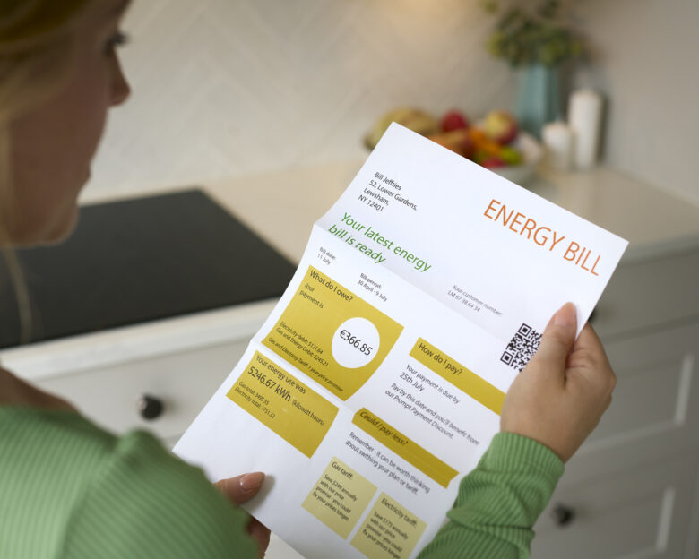 Close Up Of Woman Opening Euro Energy Bill During Cost Of Living Crisis