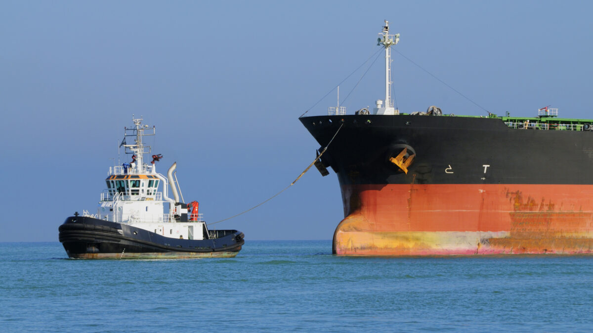 Industrial ship and tugboat