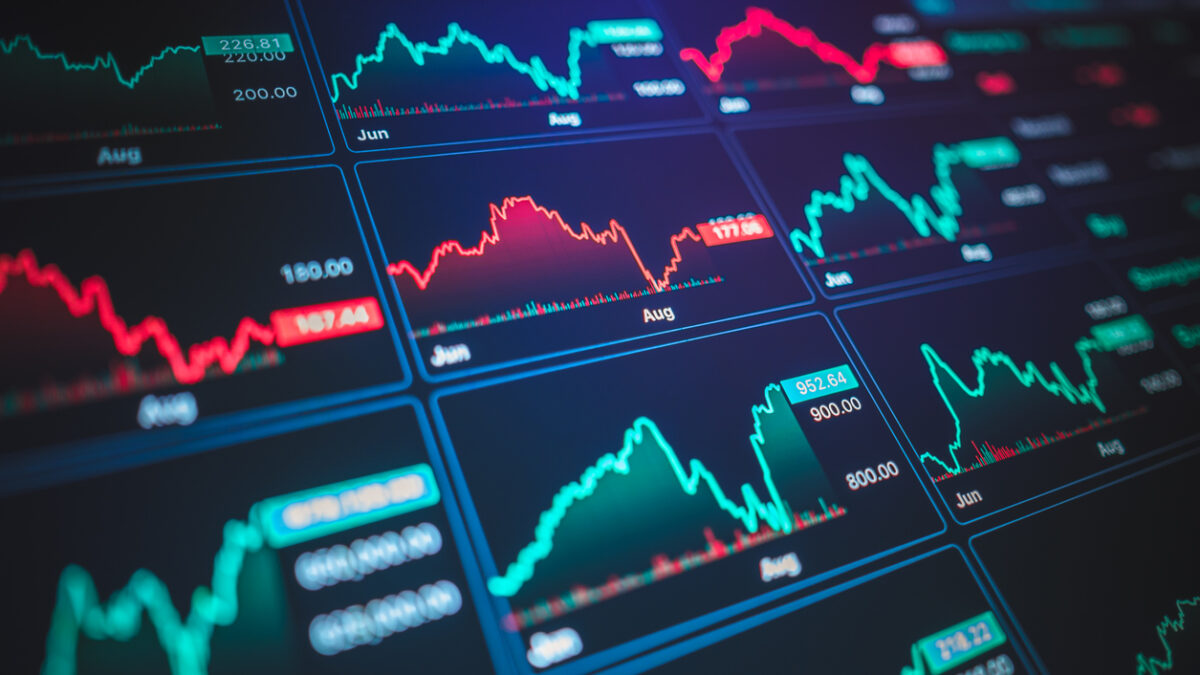 Digital financial dashboard with multiple red candlestick charts representing bearish momentum and economic distress. stock market drop, financial technology, bearish trends, AI investment tools, crisis investing, and digital economy.