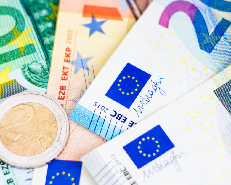 Euro money banknotes and coins close up