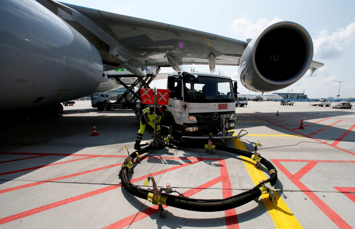 FILE PHOTO: A Lufthansa Airbus 380 is refueled in Frankfurt airport July 12, 2013. REUTERS/Ralph Orlowski/File Photo