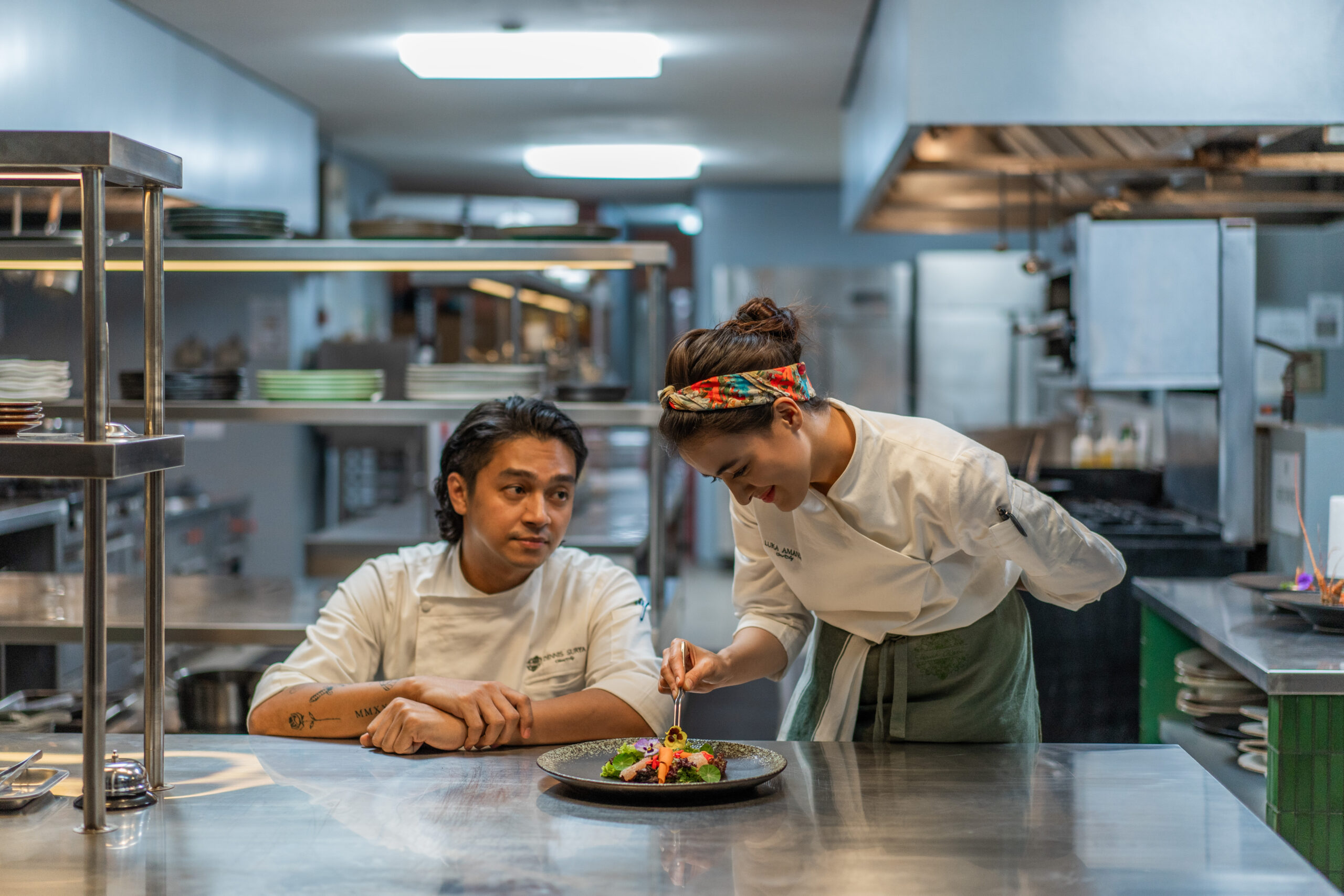 Luka Makan Cinta. (L to R) Deva Mahenra as Dennis, Mawar De Jongh as Luka in Luka Makan Cinta. Cr. Courtesy of Netflix © 2026