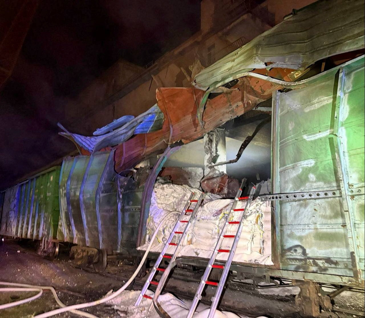 Railway containers lie damaged as port infrastructure was hit during a Russian drone strike, amid Russia's attack on Ukraine, in Odesa region, Ukraine, April 22, 2026. Head of Odesa Regional Military Administration Oleh Kiper via Telegram/Handout via REUTERS ATTENTION EDITORS - THIS IMAGE HAS BEEN SUPPLIED BY A THIRD PARTY. MANDATORY CREDIT.