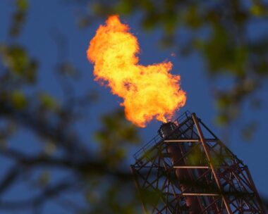Flames come out of a chimney at TotalEnergies refining and petrochemicals platform in the port of Antwerp, Belgium April 9, 2026. REUTERS/Yves Herman