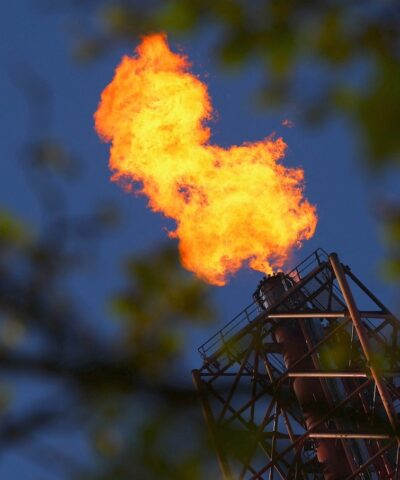 Flames come out of a chimney at TotalEnergies refining and petrochemicals platform in the port of Antwerp, Belgium April 9, 2026. REUTERS/Yves Herman